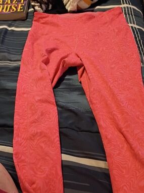 Under Armour Coral Pink Women's Track Pants with Subtle Swirl Print